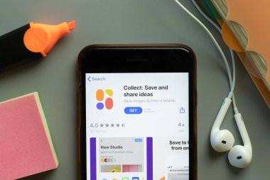 New York, ABD - 1 Aralık 2020: Mobil uygulama simgesini telefon ekranının üstünde topla, İllüstrasyon Editörü.