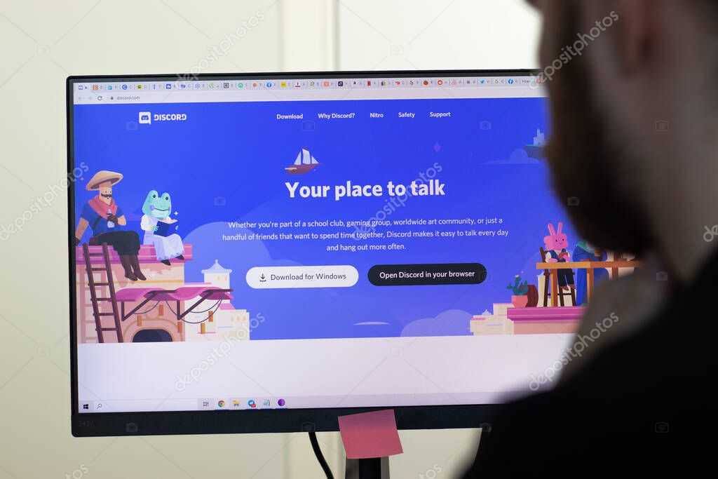 New York, USA - 26 April 2021: Discord website page on screen, man using service, Illustrative Editorial