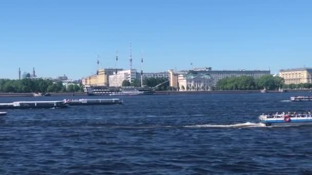 Saint Petersburg, Russia - 2 June 2021: Embankment of the Neva river with sailing tourist ships, Illustrative Editorial — Stock Video