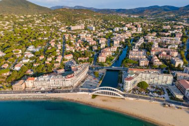 Aerial view of Sainte-Maxime seafront and its famous bridge in French Riviera (South of France) clipart