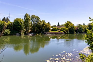 Near Giverny, the Seine River bank in Bennecourt, Yvelines, France clipart