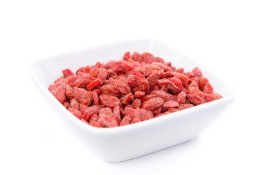 Raw and healthy goji berries in white bowl clipart