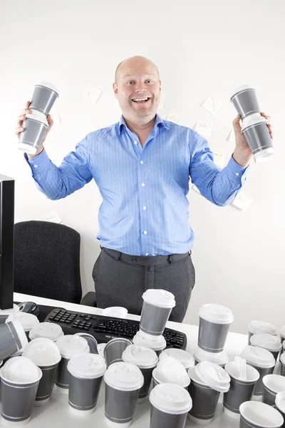Happy businessman addicted to coffee — Stock Photo, Image