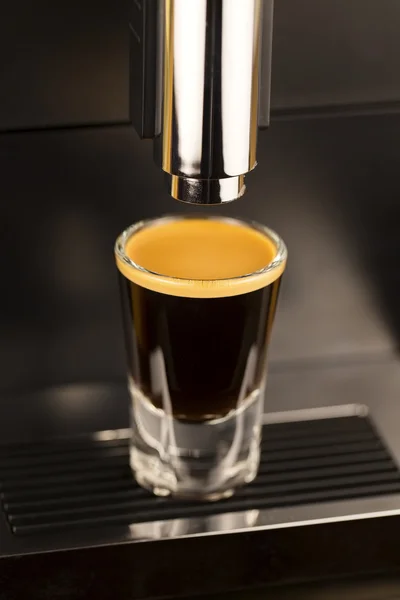 Double espresso shot from exclusive coffee machine — Stock Photo, Image