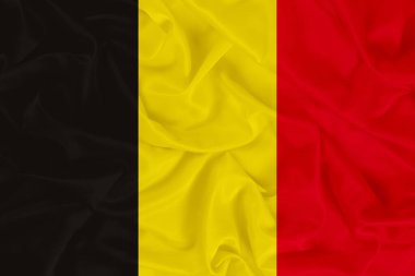 Belçika 'nın ulusal bayrağı gölgeli kumaş arka plan, Belçika bayrağı, gerçekçi sembol-bayrak sallama