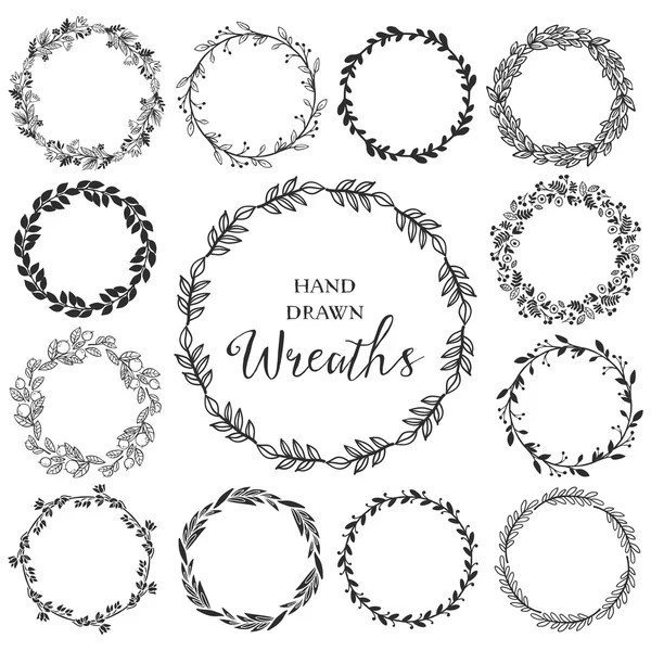 Vintage set of hand drawn rustic wreaths. — Stock Vector