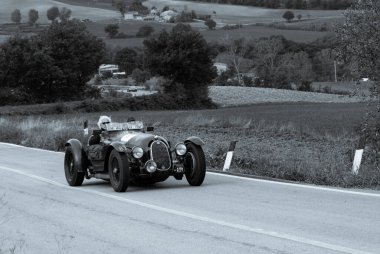CAGLI , ITALY - OTT 24 - 2020 : ALFA ROMEO8C 2900 A BOTTICELLA1936 on an old racing car in rally Mille Miglia 2020 the famous italian historical race (1927-1957) clipart