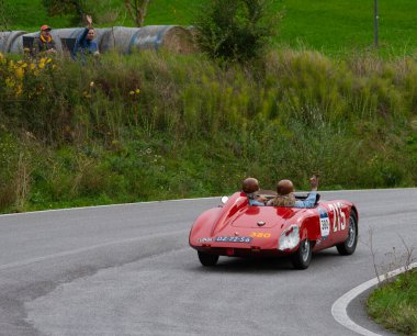 CAGLI , ITALY - OTT 24 - 2020 : OSCA S187 750 1956 on an old racing car in rally Mille Miglia 2020 the famous italian historical race (1927-1957