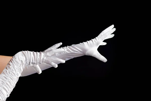 Руки жести. Леді ілюзіоністка, красиві руки в довгих білих рукавичках роблять закляття . — стокове фото