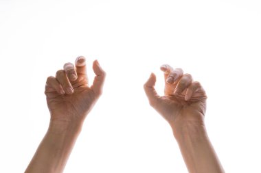 El hareketleriyle. Zarif kadınların elleri yukarıdan düşen bir şeyi yakalar.,