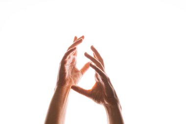 El hareketleriyle. Zarif kadınların elleri yukarıdan düşen bir şeyi yakalar.,