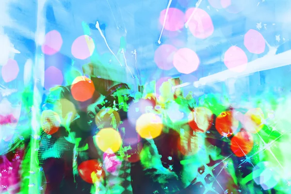 Colorful crowd on concert,disco night ,dancing concept,party and night club background