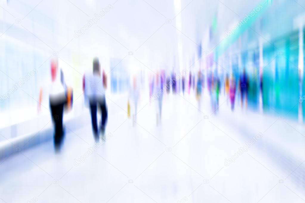 Busy crowd of people walking in metro station, Business People Walking on the Street, blurred motion,