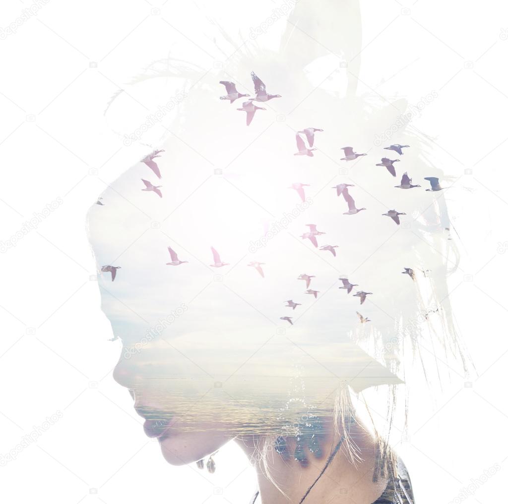 Womans head and birds flying, double exposure, freedom and liberty  background. Beauty is a gift from nature,