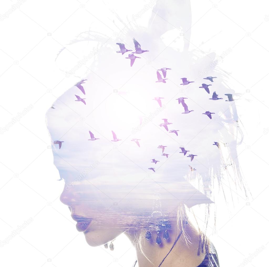 Womans head and birds flying, double exposure, freedom and liberty  background. Beauty is a gift from nature,