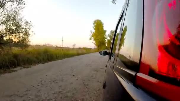 Car driving through the countryside. — Stock Video