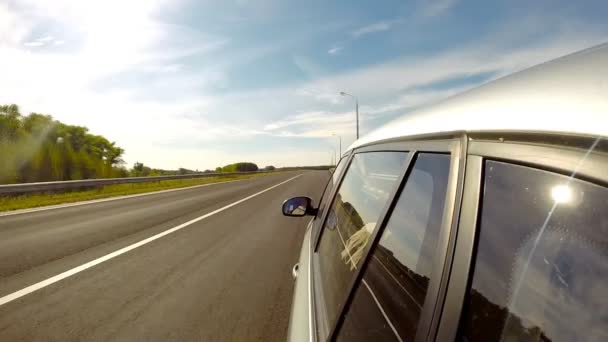 Driving a car on the overpass. The camera is left outside — Stock Video