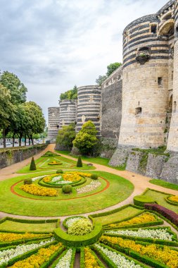 Garden and bastions of fortress in Angers clipart