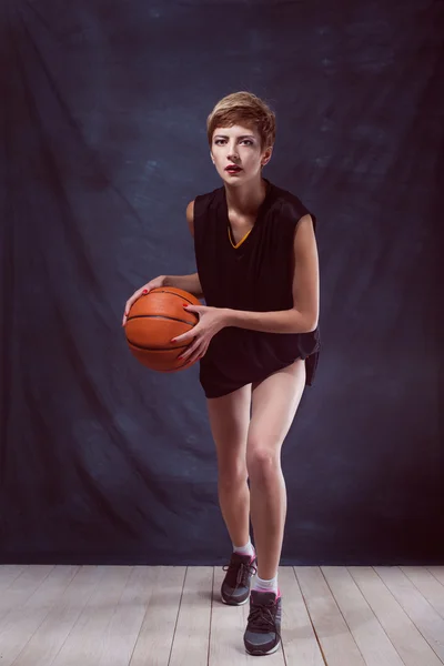 Portrait of sexy girl with basketball orange ball bare body kisses — Stock Photo, Image