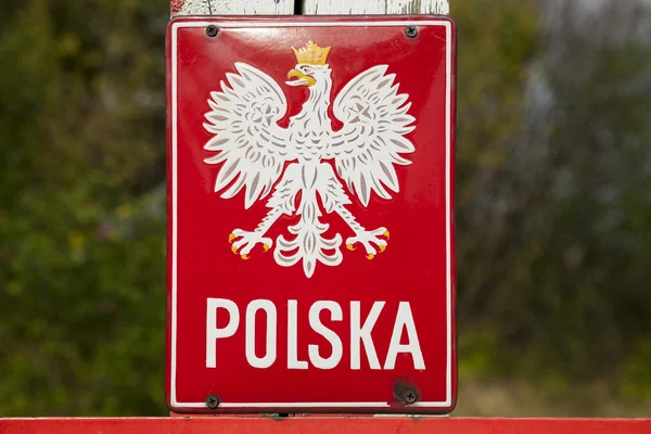 Пограничный пост и герб Польши — стоковое фото
