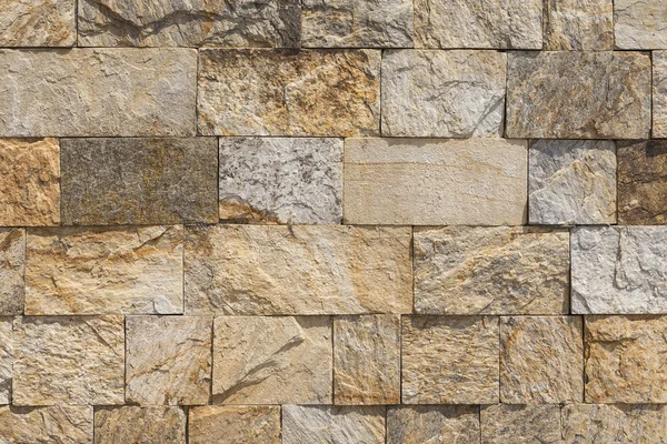 Rectangular blocks of stone arranged in the wall. — Stock Photo, Image