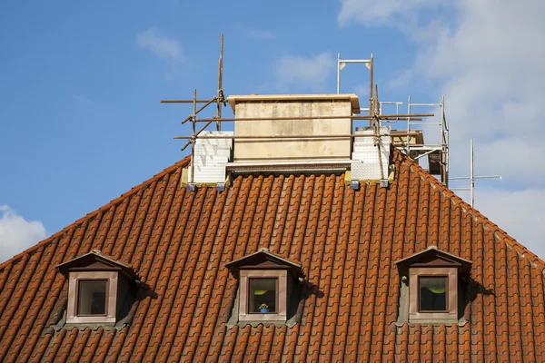 Chimney repair, roof repair. Stock Picture