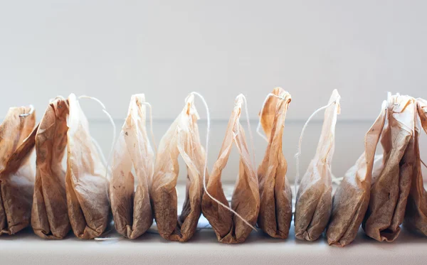 Used tea bags are stored in a row — Stock Photo, Image