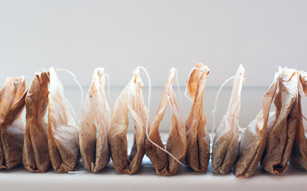 Used tea bags are stored in a row