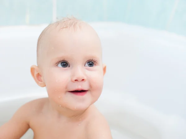 Cute one year old child taking a  bath — Stock Photo, Image