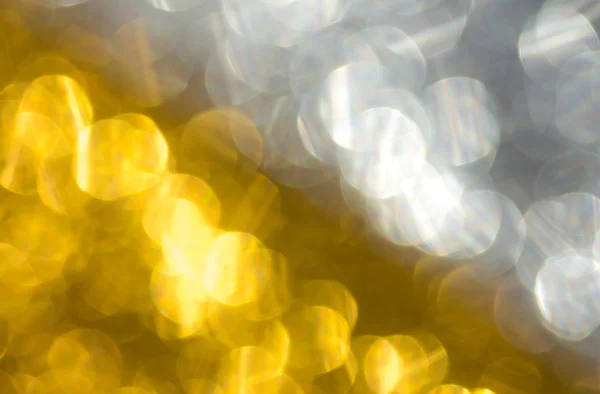 Abstrato fundo bokeh ouro e prata — Fotografia de Stock