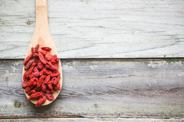 Goji berries on wooden background — Stock Photo, Image