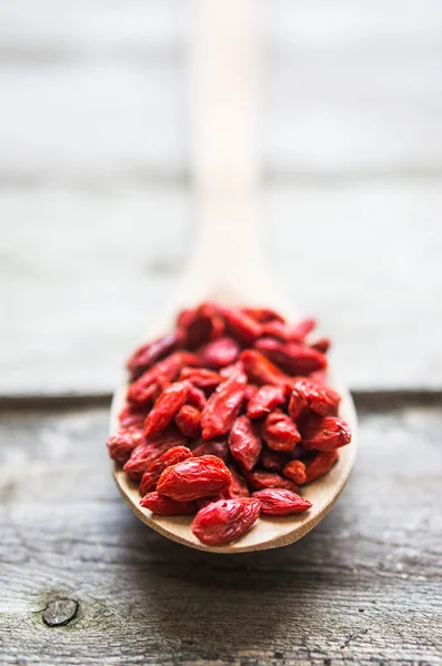 Goji berries on wooden background — Stock Photo, Image