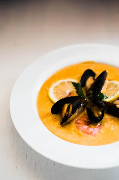 Shrimp soup with mussels on white background — Stock Image Shrimp soup with mussels on white background Stock Photo
