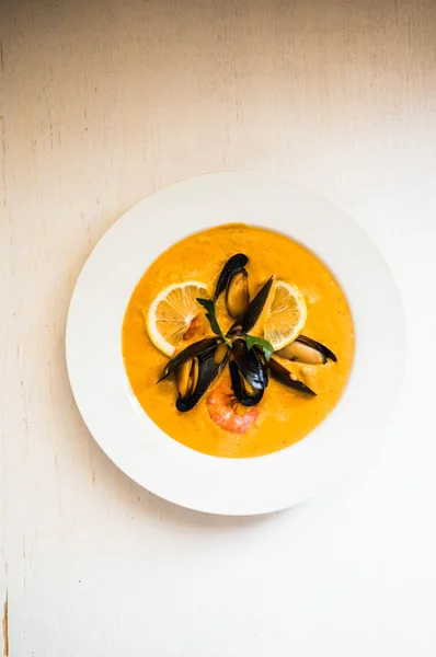 Shrimp soup with mussels on white background — Stock Image Shrimp soup with mussels on white background Stock Photo