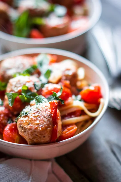 Pasta with meatballs on rustic background — Stock Photo, Image