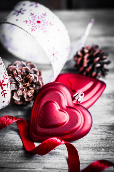 Holiday ribbon on wooden background — Stock Photo, Image