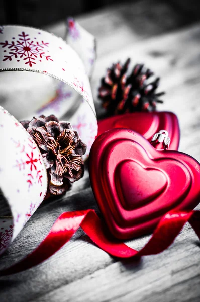 Holiday ribbon on wooden background — Stock Photo, Image