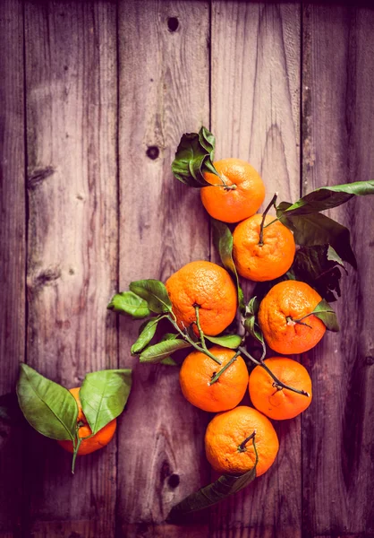 Tangerines on rustic background — Stock Photo, Image