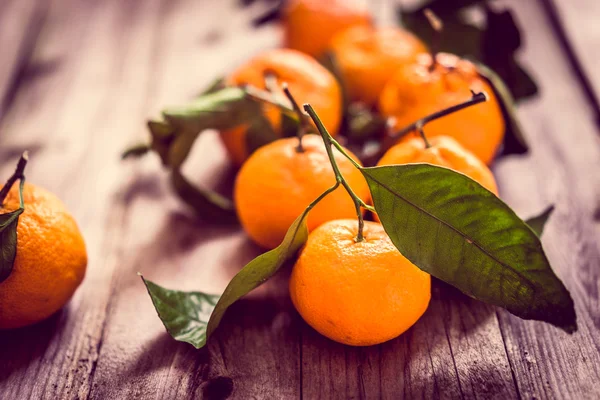 Tangerines on rustic background — Stock Photo, Image