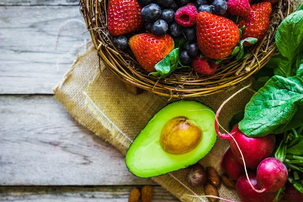 Fruits and vegetables on rustic background