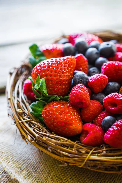 Berries on wooden background — Stock Photo, Image