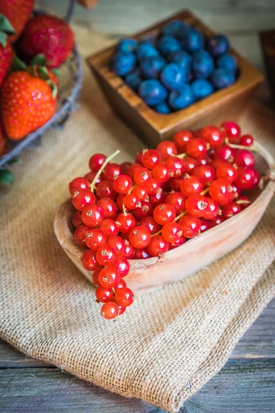 Berries on wooden background — Stock Photo, Image