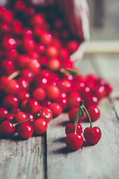 Cherries on wooden background — Stock Photo, Image