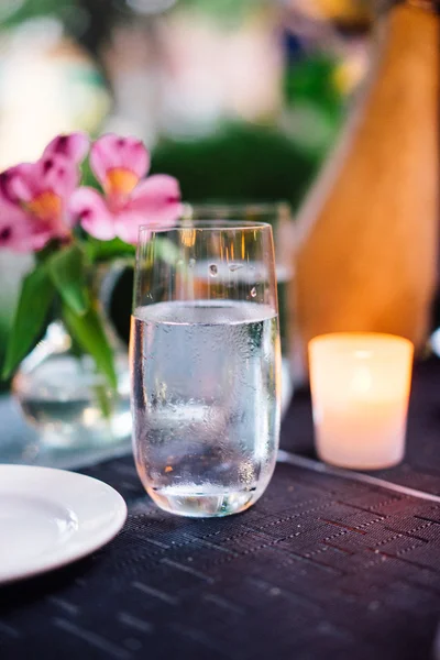 Glass of water outdoors — Stock Photo, Image