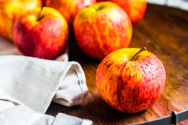 Colorful apples on wooden background — Stock Photo, Image