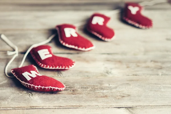 Christmas ornaments on rustic wooden background — Stock Photo, Image