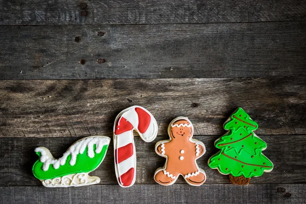 Biscoitos de Natal em fundo de madeira rústica — Fotografia de Stock