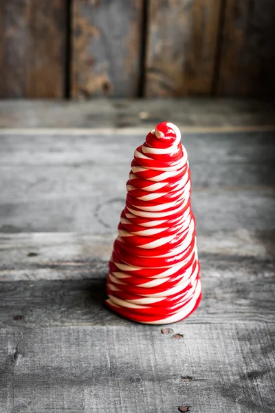 Candy cane tree on wooden background — Stock Photo, Image