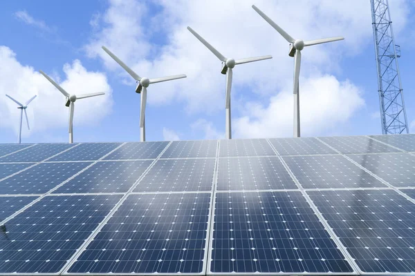 Solar panels, wind turbines and transmission towers