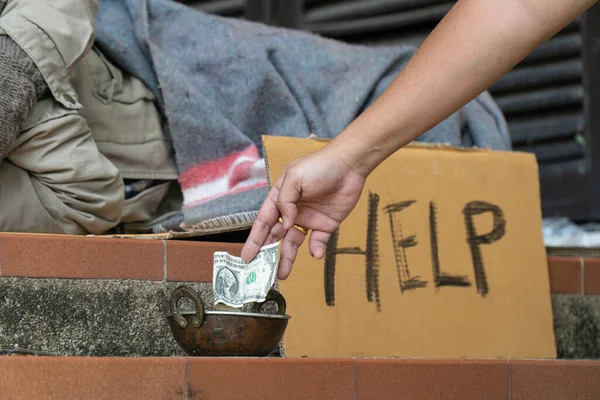 Giving Money Homeless Men Side Road — ストック写真